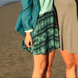 Francesca’s Blue and Green flowy patterned skirt